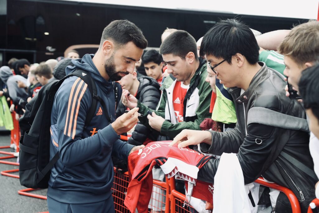 Bruno Fernandes with Manchester United fans